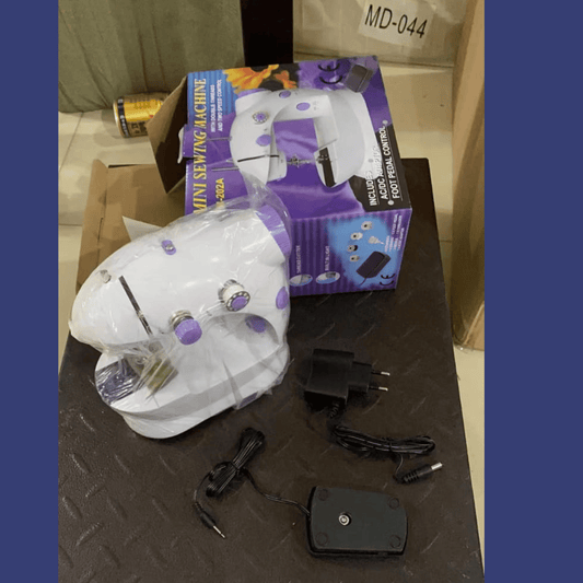 آلة الخياطة المحمولة الكهربائية